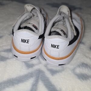 Nike Kids White Sneakers with Orange Trim